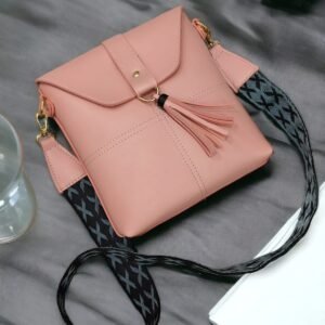 Tassel Accent Crossbody Splash Bag with Patterned Strap